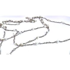 This is part of Chairish’s Fine Jewelry assortment.  A many of you know I just love long chains.  I had this made for me by my bench jeweler last year.  This is a platinum chain and it is studded with Seed Pearls and Diamonds.  There are 53 Seed Pearls and 53 Diamonds interspersed with pearl, Diamond, pearl.  The Pearls are all perfect and sized 3.7mm and the Diamonds are .05 points each.  As for the Diamonds the weight is approximately 2.85 carats the weight is 11.3 grams of Platinum.  I wore this chain with a long Diamond chain together and it does make a statement.  I have been asked to find seed pearl long chains which I have had and sold, so here is a new one with all the bells and whistles. Elegant Multi-strand Silver Chain Necklace, Luxury Silver Multi-strand Jewelry, Elegant Double Strand Beaded Chain Necklace, Silver Multi-strand Pearl Chain Necklace, Elegant Multi-strand Metal Long Necklace, Luxury Silver Chain Necklace For Evening, Elegant White Chain Long Necklace, Elegant Multi-strand Silver Chain Jewelry, Luxury Long Silver Chain Necklace