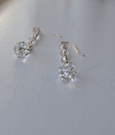 "Dainty and delicate Swarovski crystal earrings, handmade with gorgeous, clear crystals and 14K gold filled materials (or solid sterling silver). These long, drop earrings are even more beautiful in person and will add sparkle to any look. Each Sela + Sage jewelry piece comes in a matte black gift box! Discounts provided for orders of multiple items. The matching necklace can be found here: https://www.etsy.com/listing/152947271/14k-gold-swarovski-crystal-back-drop - Materials: 14K Gold Filled, Sage Jewelry, Bridesmaid Earring, Crystal Wedding Earrings, Crystal Earrings Wedding, Crystal Bridal Earrings, Swarovski Beads, Long Drop Earrings, Swarovski Crystal Earrings, Clear Crystals