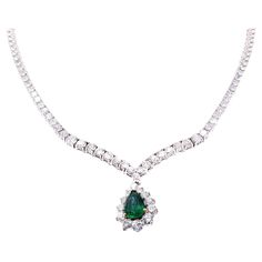 1970s platinum diamond riviera V-shape necklace with emerald diamond pendant. The approximate total diamond weight is 15 carats and the pear shaped emerald approximately 2.60 carats. The pendant can be detached from the necklace so that it can be worn as a diamond only necklace. Signed " Cartier " and numbered. Length 15.5 inches. Luxury Princess Cut Emerald Jewelry, Luxury Emerald Cut Necklace For Anniversary, 1stdibs Jewelry, Cartier Emerald, Vintage Cartier Watch, Riviera Necklace, Emerald Diamond Pendant, Necklace With Emerald, Cartier Diamond