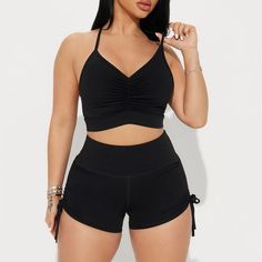 Fashion Nova Two-Piece Workout Set In Black. Stretchy Nylon/Spandex. High Waisted Shorts With Approx 2” Inseam And Self Tie Ruching At Sides. Matching Racerback Sports Bra With Removable Padded Cups. Size Medium. New With Tags, No Flaws. Ruched Summer Yoga Activewear, Ruched Summer Athleisure Activewear, Ruched Athleisure Activewear For Summer, Summer Ruched Athleisure Activewear, Summer Ruched Activewear For Workout, Ruched Activewear For Summer Workouts, Sporty Ruched Activewear For Summer, Athleisure Stretch Swimwear With Drawstring, Stretch Ruched Activewear For Gym