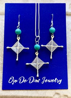 "Sterling Silver Handmade Ojo De Dios necklace wound with Fine Silver. This is an earring and necklace set. The beads are natural turquoise. The pendant comes with your choice of either 16\" or 18\" box chain. Please message me with what length you would like. Ojo De Dios ( Eye Of God) This special symbol has been made and used throughout North American cultures for thousands of years. Originally crafted by the Huichol (Wixáritari) Indians and used for protection and spiritual traditions." Turquoise Spiritual Jewelry With Matching Earrings, Eye Of God, Earring And Necklace Set, Gods Eye, Special Symbols, Eye Jewelry, Natural Turquoise, Box Chain, Fine Silver