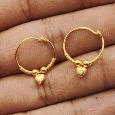 Discover the allure of Handmade Gold Jewelry at https://morvijewels.etsy.com/   Get a dazzling 25% off on all our 22k and 18k gold pieces. Don't miss out on this limited-time offer. Shop now and embrace the radiance of gold!Beautiful yellow gold earrings  Gold Purity- 20k yellow Gold Length - 2  cm Width - 1.8 cm Weight - 1.4 grams approx Click here  https://morvijewels.etsy.com/    to get more discount and offers Happy to take wholesale bulk orders. 22k Gold Round Danglers For Gift, 22k Gold Earrings For Puja, Traditional Hoop Earrings For Anniversary, Small Hoop Jewelry For Festivals As Gifts, Small Hoop Jewelry For Festivals And Gifts, Small Hoop Nose Rings For Wedding, Festival Gift Small Hoop Earrings, Festival Gift Small Hoop Jewelry, Gold Temple Jewelry Hoop Earrings As Gift