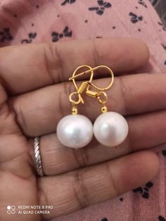 23'' 626 Carat AAA Quality Natural Fresh Water Pearl round Pearls Baroque Pearl With gold Plated Pendent Gemstone Necklace with earring Stone :Natural Fresh Water Pearl Shape : round Size :-13*13- 15*15mm Weight :- 626 carat length - 23 inch Pendent - gold Plated Polish :- Handmade Purity :- 100% Natural Gemstone color - white (If you want maximum or minimum quantity of this size other than listed, let me know, i will list/provide it to you in wholesale price.) Click below to see live stock: htt Adjustable Pearl Necklace, White Round High Luster Jewelry, White High Luster Round Jewelry, Pearl White Jewelry With Pearl Chain, Gold Jewelry With High Luster, High Luster Gold Jewelry, Classic Jewelry With High Luster Round Pendant, Classic Round Pendant Jewelry With High Luster, Classic High Luster Round Pendant Jewelry