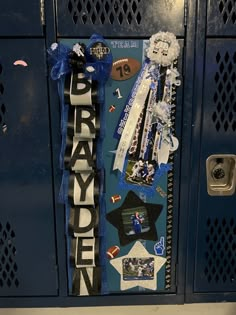 the locker is decorated with blue and white ribbons, football memorabilia, and other sports related items