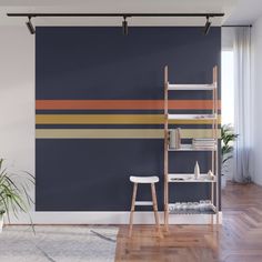 an empty room with a ladder, bookshelf and plant on the floor wallpaper mural print