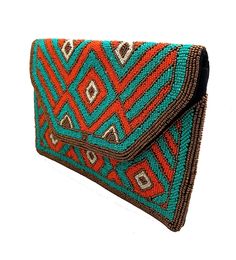 Meet your new best accessory! Check out this beautifully handcrafted multicolor, beaded clutch. Let your bag complete your outfit. Trendy Multicolor Beaded Shoulder Bag, Trendy Multicolor Evening Bag, Trendy Brown Clutch For Party, Beaded Rectangular Pouch, Multicolor Beaded Shoulder Bag, Multicolor Rectangular Evening Bag With Handwork, Handmade Multicolor Rectangular Evening Bag, Bohemian Beaded Rectangular Evening Bag, Multicolor Rectangular Evening Bag