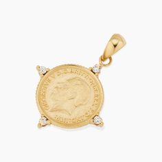 Our Legacy Coin Pendant Charm is the perfect bridge of history and style. Celebrating legacy, it depicts King George V, celebrated for his leadership during a pivotal era. The coin's vintage allure is enhanced by modern design elements, making it a versatile addition to any jewelry collection. Classic Coin Pendant Necklace For Commemoration, Classic Round Coin Pendant Jewelry, Classic Coin Jewelry For Commemoration, Elegant Commemoration Coin Pendant Jewelry, Elegant Coin Pendant Necklaces For Commemoration, Luxury Gold Jewelry With Historical Design, Commemorative Coin Pendant Medallion Jewelry, Commemorative Medallion Coin Pendant Jewelry, Vintage 14k Gold Coin Pendant Jewelry