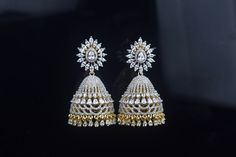 Most beautiful Gorgeous fully American Diamond embedded Jhumkas with Push. Back style.  This  stone are with  sparking shine gives a unique look Luxury Bollywood Style Pearl Drop Jhumkas, Luxury Bollywood Style American Diamond Jhumkas, Closed Setting Diamond Jhumkas, Luxury American Diamond Bridal Earrings For Diwali, Luxury Fusion Style Cutdana Jhumkas, Luxury Diamond Jhumkas As Gift, Silver Diamond Bollywood Jhumkas, Bollywood Style Silver Diamond Jhumkas, Bollywood Style Diamond Jhumkas