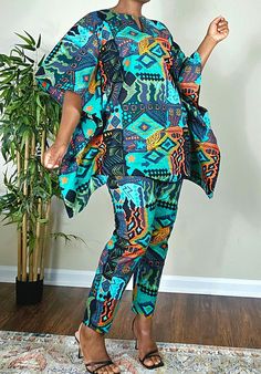 This stunning two-piece tie dye set is perfect for any occasion, from weddings to casual outings. Made with %100 cotton and featuring a vibrant tie-dye pattern, this outfit is both comfortable and stylish. The oversized kaftan top has a flattering V-neckline and 3/4 sleeves, while the pants have a straight leg style with an elastic waist and pockets.  The set includes an embroidered accent and is available in size M, L, and XL. This African-inspired outfit is perfect for those who love bold, col Casual Printed Pant Set For Summer, Multicolor Pant Set For Vacation In Spring, Multicolor Pant Set For Spring Vacation, Summer Patterned Loungewear Sets, Spring Vacation Multicolor Pant Set, Multicolor Bohemian Pant Set For Summer, Casual Patterned Printed Sets, Bohemian Multicolor Pant Set For Spring, Bohemian Green Pant Set For Summer