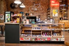 the inside of a coffee shop with various items on display