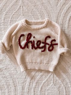 Hand stitched infant sweater Cream Winter Sweater With Letter Print, Cream Letter Print Sweater For Winter, Winter Cream Sweater With Letter Print, Cute Winter Sweater With Letter Print, Cute Letter Print Winter Sweater, Fall Cotton Sweater For Playtime, White Knitted Sweater For Playtime, Cotton Sweater For Fall Playtime, Cotton Sweater For Playtime In Fall