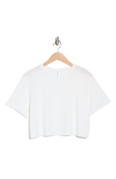 A cropped silhouette adds eye-catching attention to your waistline when you wear this boxy cotton-blend T-shirt. Crewneck Short sleeves 60% cotton, 40% modal Machine wash, dry flat Imported Cropped Shirt, Crop T Shirt, 6th Grade, Crop Tshirt, Christmas Wishlist, Dream Clothes, White Tshirt, Shopping Cart, Shopping List