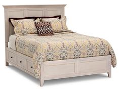 a bed with two drawers underneath it and a pillow on the headboard, in front of a white background