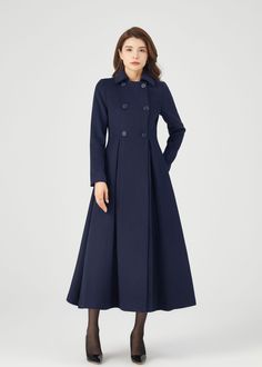 "FEATURES 50% wool, 50% wool blend Fully liner with polyester Two side pockets Lapel collar Long sleeve Button closure in front Fitted waist Navy wool coat Long wool coat For Winter, Autumn dry clean ★★Mode size Height 170cm (5′ 7″)  Bust 84 cm (33\")  Waist 66 cm (26\")  She wears size XS. ★★Bespoke Order Service If you Request other color Request the length Your height is not between 155 cm- 175 cm Your weight is not between 47 kg -77 kg I can do it for you, It will need some extra fee depending on on your need. Contact with me for more detail. ★★ Warmly Note: 1 ) : Please confirm your shipping address! If you wish to ship the item to a different address, please send me a message immediately after purchase. We can't change it after shipping, thank you for your understanding. 2 ) : Due to Tailored A-line Outerwear For Winter, Tailored A-line Outerwear For Fall, Tailored A-line Winter Outerwear, Winter Long Sleeve Peacoat For Work, Winter Peacoat For Workwear, Winter Workwear Peacoat With Long Sleeves, Winter Office Peacoat With Buttons, Winter Long Sleeve Wool Coat, Tailored Long Sleeve Peacoat For Winter