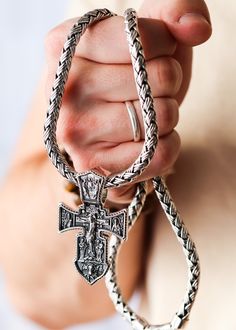 Show off your faith with this luxurious silver orthodox cross. Crafted from gleaming silver and featuring intricate detailing, this is a divinely stylish piece of jewelry that will add a touch of elegance to any outfit. Wear with pride and inspiration. Sterling silver Pendant: 64 x 38 mm Bail: 14 x 8.7 mm Please note: pendant only; chain sold separately Shown with: HEAVY SILVER BALI NECKLACE (7 MM) Handcrafted Silver Cross Processing time 1-3 business days Luxury White Gold Cross Necklace, Luxury Cross Pendant Necklace, Luxury Sterling Silver Cross Necklace, Traditional Engraved Crucifix Jewelry, Byzantine Cross Necklace With Engraving, Luxury Silver Cross Necklace, Luxury Silver Sterling Silver Cross Necklace, Luxury Sterling Silver Cross Necklace In Silver, Engraved White Gold Cross Necklace