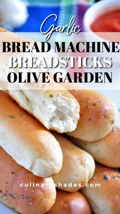 garlic bread machine breadsticks are piled on top of each other with the words garlic bread machine breadsticks olive garden