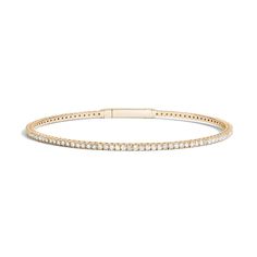 A timeless style, this Shahla lab-created diamond bangle bracelet sparkles from day to night. 14K gold Shimmering lab-created diamonds line this classic tennis-style bangle Flexible design for comfortable all-day wear 1-1/2 cts. t.w. of lab-created diamonds 7.0 inches in circumference; push and lock clasp Each item is custom made and not eligible for returns Classic Gold Bangle Bracelet With Diamond Accents, Classic Diamond White Bangle With Diamond Cut, Classic Yellow Gold Bangle With Brilliant Cut, Classic Diamond White Bangle With Diamond Accents, Classic Bangle With Single Cut Diamonds, Classic Diamond Cut Bangle In Diamond White, Classic Yellow Gold Tennis Bracelet With Single Cut Diamonds, Classic Diamond Cut White Bangle, Classic Yellow Gold Diamond Bangle