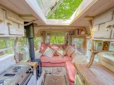 the inside of a tiny home with lots of furniture