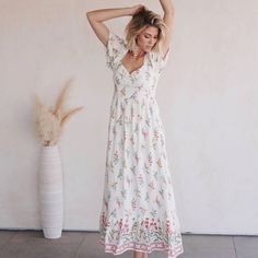 New With Tags, Long White Floral Dress Spring Beach Non-stretch Maxi Dress, Spring Beach Maxi Dress Non-stretch, Non-stretch Maxi Dress For Spring Beach Occasions, White Non-stretch Maxi Dress For Brunch, Non-stretch Floral Print Sundress For Spring, Spring Feminine V-neck Boho Dress, V-neck Boho Sundress For Garden Party, Spring Boho Dress With Floral Print For Garden Party, Spring Non-stretch Maxi Dress For Day Out