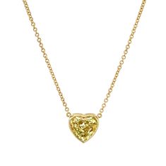 Drape yourself in luxury with our Certified 18k Yellow Gold Heart Shape Yellow Diamond Pendant. This exquisite piece features a captivating yellow diamond meticulously crafted into a heart shape, symbolizing love and opulence. Set in radiant 18k yellow gold, the pendant adds a touch of warmth and sophistication to any ensemble. The diamond is certified for its exceptional quality, ensuring enduring beauty. Luxury Yellow Gold Heart-shaped Diamond Necklace, Yellow Gold Heart Necklace With Gemstone, Yellow Gold Gemstone Heart Necklace For Anniversary, Anniversary Yellow Gold Heart Necklace With Gemstone, Fine Jewelry With Single Cut Yellow Diamonds, Valentine's Day Yellow Gold Gemstone Heart Necklace, Valentine's Day Yellow Gold Heart Gemstone Necklace, Yellow Gold Double Heart Gemstone Jewelry, Fine Jewelry Yellow Gold Heart-cut