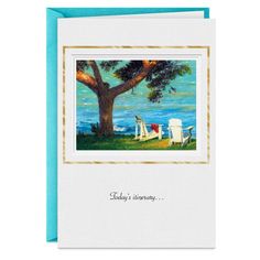 a greeting card with the words today's anniversary and two chairs under a tree