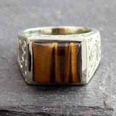 Hand Crafted Sterling Silver and Tiger Eye Men's Ring - Warmth | NOVICA Single Stone Ring, Tigers Eye Gemstone, Gem Ring, Eye Ring, Anniversary Gifts For Him, Gems Jewelry, Mens Wedding Bands, Cocktail Rings, 925 Sterling Silver Ring