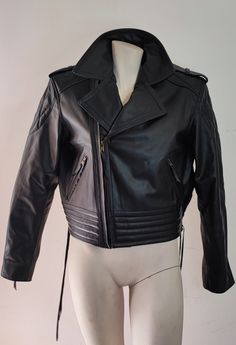 1:1 reproduction of the leather jacket used by Freddie Mercury in the 1980/81 "Queen Rock Montreal" live shows, tailor-made. Waiting time after order approximately 30 days. Rock Style Long Sleeve Leather Jacket, Rock Style Leather Jacket With Long Sleeves, Rock Style Fitted Leather Jacket For Biker Events, Rock Style Leather Jacket For Fall, Rock Style Leather Biker Jacket For Streetwear, Leather Biker Jacket For Streetwear In Rock Style, Winter Leather Jacket For Concerts, Punk Style Leather Jacket For Concerts, Punk Leather Jacket For Concerts