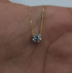 This is a beautiful Lab Grown diamond design pendant. It is set in real solid 14Kt Gold and the chain is 14Kt Gold as well. You can choose if you want 14Kt White Gold, 14Kt Yellow Gold or 14Kt Rose Gold. We have a lot of beautiful jewelry with natural diamonds. If any listing states "diamond" then it is a natural diamond. If the listing states "Lab Grown" it is a Lab Grown diamond. The chain is attached so the diamond sits comfortably on you when you wear it. This is the perfect gift for mom, wi Gold Solitaire Necklace In Moissanite, Dazzling Gold Solitaire Necklace With Vvs Clarity, Gold Solitaire Moissanite Necklace With Diamond Cut, Gold Solitaire Necklace With Diamond Cut Moissanite, Gold Dazzling Solitaire Necklace With Prong Setting, Gold Solitaire Necklace With Vvs Clarity, 14k Gold Solitaire Necklace With Diamond Cut, 14k Gold Solitaire Necklace With Prong Setting, Dazzling Gold Solitaire Moissanite Necklace