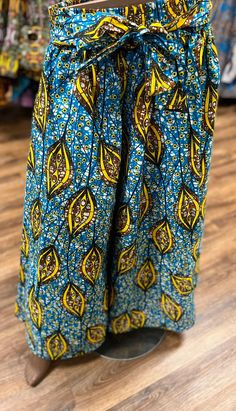 This  is a beautiful ethnic skirt that has an elastic waist band that allows it to fit multiple sizes. A waist tie belt and pockets on the sides for comfort and play. The Length 37 inches long. Why not add this to your collection of wearable art today, Please don't delay. Traditional Long Maxi Skirt For Beach, Bohemian Flared Maxi Skirt With Elastic Waistband, Multicolor Long Skirt With Elastic Waistband, Traditional Skirt Bottoms For Beach, Traditional Skirt For Beach, Bohemian Gathered Skirt Bottoms For Festival, Traditional Long Skirt For The Beach, Traditional Pleated Skirt For Summer, Traditional Pleated Summer Skirt