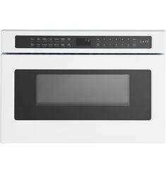 a white microwave oven with the door open and black trim on it's side