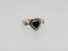 Vintage Sterling Silver Black Onyx Heart Ring ...Marked 925...Total of weights 3.1grams...Size 8...Measure of Face 10.5MM...It's in very good condition. B Black Heart Cut Ring For Gift, Black Heart Cut Heart Ring As Gift, Black Sterling Silver Heart Ring Gift, Gift Black Sterling Silver Heart Ring, White Topaz Engagement Ring, Topaz Engagement Ring, White Topaz, Black Onyx, Vintage Sterling Silver