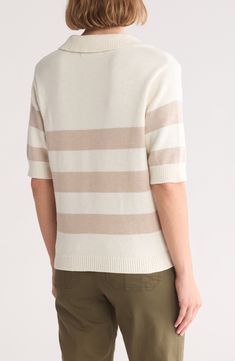 Blocky stripes lend timeless charm to this polo-inspired sweater that's knit from soft cotton yarn. 22" length Spread collar V-neck Short sleeves 100% cotton Machine wash, dry flat Imported Striped Cotton Crew Neck Knit Top, Striped Cotton Knit Top With Crew Neck, Casual Striped Cotton Polo Sweater, Classic Striped Cotton Sweater, Classic Striped Knit Tops, Striped Cotton Sweater With Ribbed Collar, Cream Cotton V-neck Knit Top, Classic Striped Knit Sweater, White Cotton Sweater With Horizontal Stripes