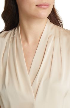 Soft ruching at the stand collar and shoulders releases elegant drape to the surplice front of a versatile shell sewn from stretch-woven silk. 27" length (size Medium) V-neck Sleeveless Sheer 91% silk, 9% elastane Dry clean By Kobi Halperin; imported Individualist Elegant Blouse With Band Neckline For Work, Elegant Band Neckline Tops For Workwear, Elegant Draped Top For Workwear, Elegant Draped Workwear Tops, Elegant Folded Top For Evening, Elegant Evening Tops With Folds, Elegant Blouse With Folds For Spring, Elegant Draped Blouse For Workwear, Elegant Draped Workwear Blouse