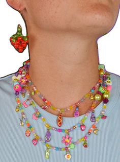 Fun Multicolor Charm Jewelry, Playful Dangle Necklaces With Charms, Playful Dangle Charm Necklace, Playful Dangle Charms Necklace, Playful Multicolor Necklaces With Charms, Playful Jewelry With Round Beads And Charms, Playful Jewelry With Round Bead Charms, Playful Jewelry With Charms And Round Beads, Whimsical Multicolor Jewelry With Dangling Charms