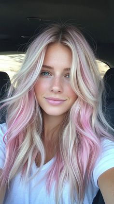 Add a bold touch with magenta pink tips that stand out on tan skin. Visit our page for tips on achieving this vibrant look. Save this pin for hair tip ideas! Tags: #MagentaPinkTips #HairColor #TanSkin Pink Pieces In Blonde Hair, Blonde Hair With Pale Pink Highlights, Cute Hairstyles Dyed Hair, Blonde Pastel Pink Hair, Light Pink Money Piece Hair Blonde, Rooted Hair Color, Pink Frosted Tips Hair, Pink Hair Accents