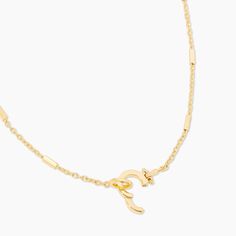 Elegant Yellow Gold Toggle Necklace With Adjustable Chain, Classic Gold-tone Clavicle Chain Necklace, Classic Gold Initial Necklace With Delicate Chain, Gold Classic Initial Necklace With Delicate Chain, Everyday Gold Lariat Necklace With Lobster Clasp, Classic Gold Name Necklace With Delicate Chain, Formal Adjustable Brass Chain Necklace, Gold Initial Pendant Jewelry With Cable Chain, Delicate Chain Gold Plated Initial Pendant Necklace