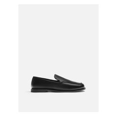 Slippers style loafers. High quality leather construction. Rolled seam at instep. Rounded shape. Classic Flat Slip-ons For Business, Modern Business Slip-ons With Contrast Sole, Business Slip-on Flat Loafers, Business Loafers With Stitched Sole And Slip-on Fit, Modern Flat Loafers For Business, Classic Slippers With Rubber Sole, Classic Flat Slip-ons With Leather Footbed, Classic Slippers With Removable Insole, Classic Slip-on Slippers With Round Toe