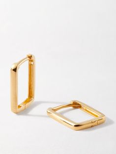 Let your ears do the talking. Step it up with these dainty rectangle huggie hoop earrings. Dress up your daily staples or take them into the night. 14k recycled solid gold. Earrings are 9.7mm x 12.5mm. Width 1.5mm width. Sold as a pair. Rectangular Minimalist Hoop Earrings, Tarnish Resistant, Minimalist Rectangular Hoop Earrings, Tarnish Resistant, Yellow Gold Square Hoop Earrings For Everyday, Minimalist Rectangular Tarnish-resistant Hoop Earrings, Minimalist 14k Gold Rectangular Earrings, Gold Rectangular Huggie Earrings For Everyday, Minimalist 14k Gold Rectangular Hoop Earrings, Gold Rectangular Minimalist Huggie Earrings, Rectangular Yellow Gold Huggie Earrings Minimalist Style