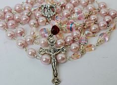 "Beautiful, handcrafted baby pink catholic rosary feat: Blessed Virgin -  Measures approximately 24\" L Peruse our shop for other great finds - https://www.etsy.com/shop/AyCarambaGifts?ref=seller-platform-mcnav Note: Shipping overages over $1 are automatically credited back to your account. All items ship immediately. If you need additional images, info please do not hesitate to contact us." Handmade Pink Rosary For First Communion, Handmade Pink Spiritual Rosary, Handmade Pink Rosary For Baptism, Handmade Pink Rosary With Round Beads, Handmade Pink Rosary With Cross Shape, Handmade Pink Rosary With Cross, Handmade Pink Rosary In Cross Shape, Handmade Pink Cross Rosary, Blessed Mother Mary