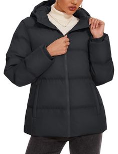 a woman wearing a black puffy coat