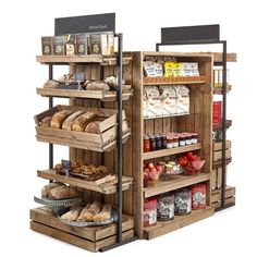 two wooden shelves filled with different types of bread and other food items on display in front of a white background