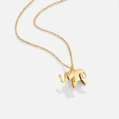 Elephants are one of the strongest and largest animals on our planet today. These beautiful creatures traditionally represent strength, power, and loyalty. Elephants are known for their clever natures and are often seen as good luck symbols throughout the world. Invite peace and clarity into your life when you wear this adorable necklace. Never forget the power you hold within yourself. Waterproof & tarnish-free Stainless steel, gold-plated Size: 15.7in (+ 2in adjustable) Size (pendant): 0.4in x 0.6in Lobster clasp closure Hypoallergenic, lead & nickel free If you aren't in LOVE with your purchase, please let us know within 30 days of receiving your item, and you'll receive a stress-free refund. Minimalist Good Luck Pendant Necklaces, Minimalist Good Luck Necklace With Round Pendant, Gold Animal Design Necklace For Gift, Gold Necklace With Animal Design For Gift, Animal Design Jewelry Gift, Luck Symbols, Elephant Necklace Gold, Good Luck Symbols, Gold Elephant