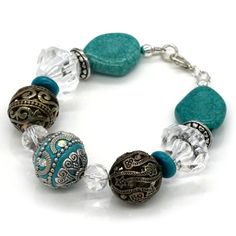 Tibetan Style Beads. Turquoise Stones. Chrystals Silver Beads. Antiqued Metal Beads. Custom Made. Great Detail. Length 7.5 Inches. Turquoise Crystals, Mini Bracelet, Dragonfly Bracelet, Monogram Bracelet, Citrine Bracelet, Bow Bracelet, Turquoise Crystal, Bangle Bracelet Set, Vintage Bangles