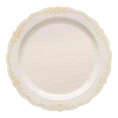 a white plate with gold trimmings on the rim and bottom, sitting on a white surface