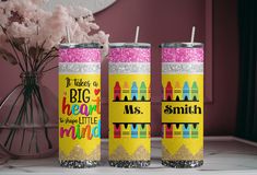 three personalized tumbles with glitter on them