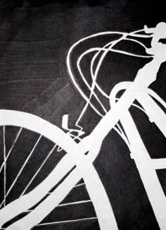 the silhouette of a person riding a bike on a black background with white lines and circles