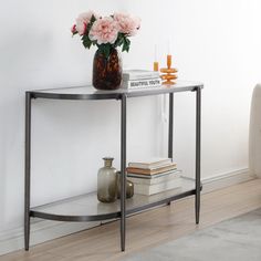 The Wilmor Luxurious & Durable Gunmetal Gray or Golden Versatile Functional Fluted Glass Trendy 43.11" Console Table. This console table is a statement piece that elevates any living space. This console table features a sleek black tempered glass top, providing a sophisticated surface that effortlessly complements any decor style. The striking gold-finished metal frame adds a touch of opulence, exuding luxury from every angle. This console table offers ample surface area for displaying your favo Glass Console Table Decorating, Small Entryways, Flute Glass, Gunmetal Grey, Everly Quinn, Accent Furniture, Steel Frame, Tempered Glass, Console Table