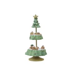 three tiered christmas tree with dogs on it's top and one dog in the middle