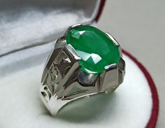 Rich Green Emerald Sterling Silver 925 Handmade Ring Product Type: Ring Ring Size: 5 US, 6 US, 7 US, 8 US, 9 US, 10 US, 11 US, 12 US, 13 US, 14 US, 15 US, 16 US Stone Type: Emerald, Zamurd Metal Type: Sterling Silver 925 Main Stone: Emerald Main Stone Color: Green Handmade: Yes, Artisan Ring Type: High Quality Heated & Treated (Lab Created) This Sterling Silver Ring is a perfect gift for men and women. The ring showcases an elegant design with unique Emerald stone. Get it for your loved one, or treatment yourself for a classic timeless style. All orders come in a special gift box. Please contact us if you don't see your size. We will do our best to obtain it from our warehouse or resize when possible. Customer Policy: ● Your satisfaction is our priority. ● We guarantee you our products qua Luxury Silver Emerald Ring For Men, Gemstones Rings, Smaragd Ring, Green Emerald Ring, Artisan Rings, Mens Engagement, Engagement Rings For Men, Green Emerald, Types Of Rings