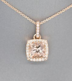 "Handcrafted Morganite and Diamond Halo 14k Rose Gold Pendant Necklace, Wedding Necklace, Bridesmaid Gift, Blush Pink Rose Gold, Gift for Her This sparkling handmade pendant necklace looks gorgeous in its rose gold setting, perfect for any occasion. The piece features a 2.70ct cushion Morganite as the main stone, which has a halo of 0.37ctw diamonds framing it. All stones are prong set in 14k rose gold, with small diamond accents on the gallery. The bale is locked in place so the pendant does no Rose Gold Wedding Necklace With Diamond Accents, Rose Gold Diamond Accent Wedding Necklace, Rose Gold Wedding Necklaces With Diamond Accents, Wedding Rose Gold Necklace With Diamond Accents, Yellow Gold Morganite Jewelry For Wedding, Rose Gold Diamond Cut Necklace For Wedding, Exquisite Formal Morganite Jewelry, Exquisite Gold Morganite Jewelry, Elegant Morganite Jewelry